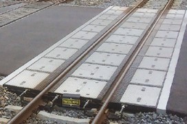gamme swisscross système RUBE by BORFLEX système pour passage à niveau en caoutchouc et béton. haute résistance, transition fluide entre la route et la voie ferrée. réduction des vibrations et chocs.